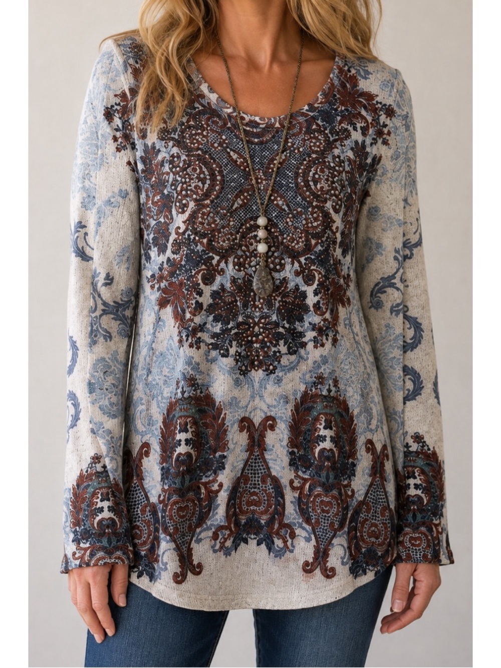 Vocal Apparel long-sleeve knit tunic top with a paisley print embellished detail
